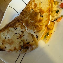 Added pico and avocado to mine, but the other one I made was just chicken, cheese, sour cream and sauce.