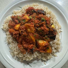 Tomatoes disintegrated quite a bit so added a can of chopped tomatoes to bulk it out.  Also left the skin on the potatoes for added vitamins. Very hot with both chilli powder and green chillies.