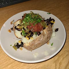 Added some corn, cilantro, bell pepper, onion, with some chilli powder. I added a little almond milk with salt to fluff the potato. Didn't have avocado so I left it out. Really good
