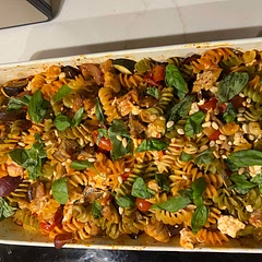 I added chicken courgette and aubergine. I used chilli harissa and a tin of tomatoes and some red wine. Topped with some more feta, pine nuts and fresh basil.