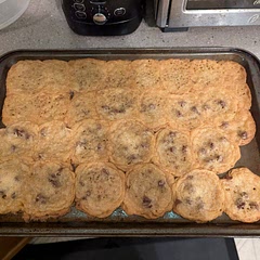 Accidentally made a giant cookie cake. 
Still so good. Made thick balls but baked into very thin cookies. 