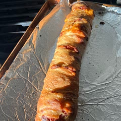 Bake 375 convection bake for 40 min 
Pizza dough, pepperoni , salami, roast peppers, mozzarella, cheddar, spices 
Sauce on side not inside- slit top brush w EVO
