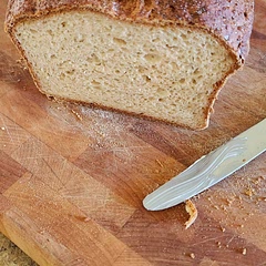 Use a silpat mat to shape bread and a cast iron frying pan for a baking steel