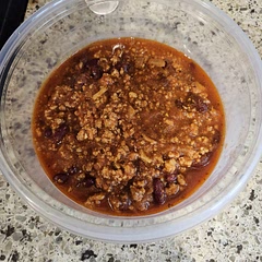 It was easy to make. I left out the chili powder and the can of tomatoes was replaced with a can of tomato paste. I only used kidney beans.