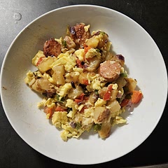 We added scrambled eggs and mixed it in. We used russet potatoes but will use a different type next time we make this. We used "Slap Ya Mama" hot sauce as well, but that's not pictured here.