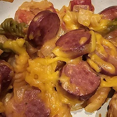 I used sharp cheddar cheese, turkey kielbasa sausage and veggies rotini and the kids LOVED it!!! The whole family loved it. The kids said it tastes like mac n cheese.