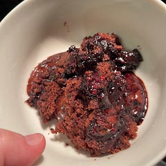 This had absolutely no business being as tasty as it was, given how easy it was to make. Barely more difficult than a mug cake and twice as nice. I wanted chocolate dessert and could not summon the energy to bake, and this took me less than 15 minutes to throw together. Like everyone else I pre made the batter and topping and stored it in the fridge, adding the hot water just before baking it at dinner time. Came out perfect after 20 mins at 180C. I added a sprinkle of freeze dried raspberry pieces under the cocoa/ brown sugar layer. 
This is my new favourite chocolate dessert to make.