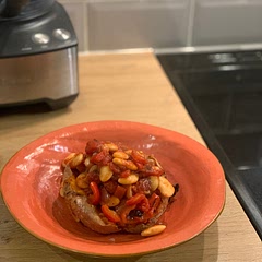 Slightly less red wine vinegar and more smoked paprika. Maybe add chorizo