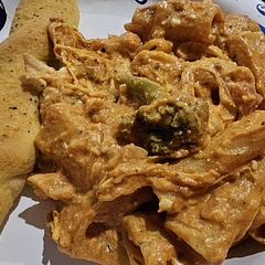 It was really good, I doubled the Sauce and Cream Cheese, next time I will cut the chicken into chunks instead of shredding it . . . Just because of a texture sensitivity.
Served with Garlic Breadsticks.
