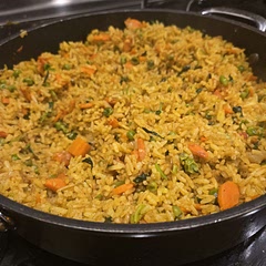 Very good as a side dish. It's going to be a staple of mine. I made the rice with the stock in a rice cooker separately from the vegetables, then moved to the pan later for added ease, and it turned out great.