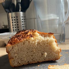 Crunchy outside, soft inside. I proofed on counter for 9ish hours and then overnight proofed in fridge for 9 hours and then on counter in container I baked it in for another 3-4 hours