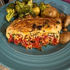 Very yummy! Served with roasted potatoes and broccoli. The most time consuming part is chopping the ingredients for the filling, fairly easy!