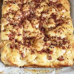 Super easy recipe to follow. Let the bread cool for about 15 minutes before icing. The taste is incredible! Would be amazing with a peanut butter icing or whiskey bacon jam too!