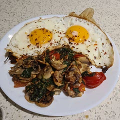 Added garlic to the mushrooms when cooking.  Didn't include the ham. Also topped with sriracha. Quick and delicious!