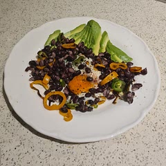 Used a combination of orange capsicum and green chilli as the chillies. Only used one egg. Served the avocado fanned out, then beans and egg on top. Also served with some hot sauce. Easy and delicious!