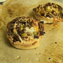 I think we rolled the wrong way and flattened the dough too much, next time will roll long end to long end and maybe add some cheese atop each roll with the garlic butter,. And maybe some onion in with the beef