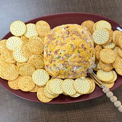 I made this for my Thanksgiving potluck at work and everyone loved it! I have already been assigned to make it again for Christmas.
I left out the poppyseeds and nuts. I eyeballed the chives and ranch seasoning. Hopefully it will be just as good next time I make it :)