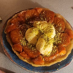 Very good! I would suggest heating longer than the given 8-10 minutes when heating the fruit/butter/sugar filling on the stove top.
I had it on medium low as directed and after 15+ minutes I pulled it, but it wasn't caramelized. The juices were still a very light golden color. I should've gone to 25 minutes or increased the heat & watched it to turn that dark brown, but bc I didn't; the tart was quite runny. However, despite this drippy part; the tart was delicious.
We had shelled pastashios, so we removed shells & ran the nuts through the food processor for quick/mess free crushing.
Delicious and unique dessert. Recommend!