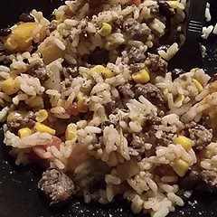 I added corn and used parboiled rice. I didn't have tomato sauce, only diced tomatoes. Still good.