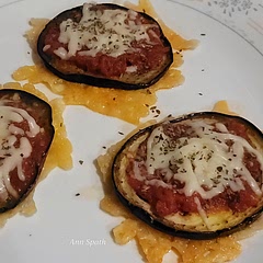 Rich tasting, beautiful.  Hard to make enough Parmigiano cheese crisps.  
Should peel eggplant first.  