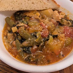 Absolutely delicious, 10/10 will be making again.  My toddler ate 2 bowls and my big kids weren't super enthused but they did eat it. I made the following adjustments:
- substituted sweet potato for the carrots
- sliced a pound of chicken breast and sauted it in the oil and removed then followed step 1
- used chicken broth instead of veggie
- my "seasonal veggies" were canned green beans, half a zucchini, and one large yellow potato (about 3 cups total)
- used a little extra garlic and substituted Italian seasoning for the oregano and thyme
- I used kale and fresh grated parmesan