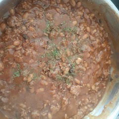 I added a teaspoon of sugar,a dabble of vinegar to give it sweet and sourness some mix herbs and a teaspoon of sweet chili sauce,some red wine and Worcester sauce to hide the smell of the wine and finishing touch of dry parsley. 