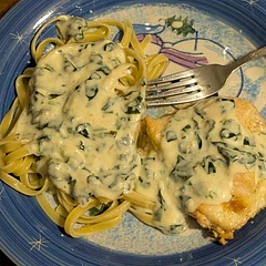 I thought this dish was fantastic and so did my family. The chicken was really moist and when you added the sauce on top it was very flavorful. I also made fettuccine to go with it so that it wasn't just the chicken and the sauce which made it delicious. The only thing that I changed was I made extra sauce and I added basil pesto to the sauce which just gave it an extra boost of deliciousness.