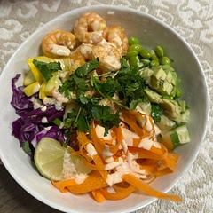 Shrimp cooked per recipe, sauce per recipe, but put our own twist on it: had it with coconut rice, ribboned carrots, cucumber, edamame, avocado, purple cabbage, zucchini, wedge of lime and cilantro. Delicious!!