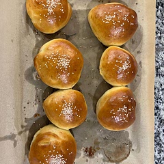 Soft and fluffy! The buns are not perfect shaped because my toddler helped me make it. My husband asked me to never buy at the market again. I let the machine mixed for me.