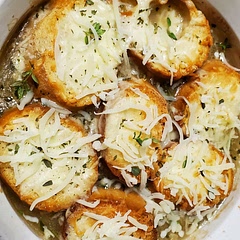 Doubled the garlic. Gave the onions an extra 15 minutes to cook down. The soup turned out amazing! Served about 6 people. Would recommend making extra bread for dipping.
