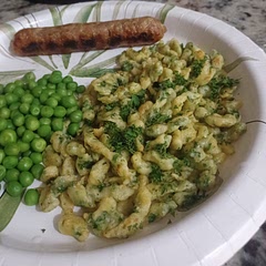 The dumplings are delicious and herby. It's easy to whip up on a weeknight. I biked some peas and pan roasted a bratwurst with it this time. 