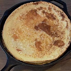 It was thick and dense like custard. Not very sweet, but we added whipped cream and berries. I adjusted the temperature to 350 Fahrenheit. Most of my family liked it. One piece was very filling.