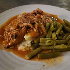 Served with mashed potatoes and green beans. Kind of like Swiss steak with chicken. 