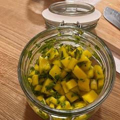 I just did mango, cilantro, Evoo, salt & lime & it was delicious. But could try adding bell pepper, onion, tomato &/or avocado to switch it up.
