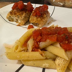 Lightly breaded, oven baked. Has a good chicken parm taste 
Side of penne
Homemade tomato sauce - diced stewed tomatoes, basil, garlic - simmered whole chicken baked