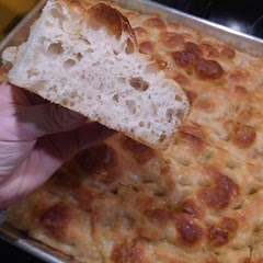 Great recipe! It has a very fluffy open crumb. I doubled the recipe, and the baking pan's size , so I needed to add additional 15 minutes to the baking time. I also was very liberal with the olive oil on the top 🫒