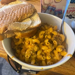 Added some bacon, and also added some heavy cream. Liquid dissipated rapidly, so that’s why I added. Pat was okay with the little bit of tomato paste so that’s good.