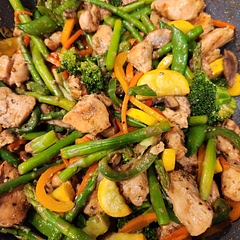 Omitted the cashews and reduced the peanut butter amount to just 2 tbsp. Added different bell pepper colors, yellow zucchini, asparagus, and mushrooms. Mixed the garlic cloves in the sauce. 