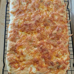 Made it with garlic, cheese, and rosemary.
Definitely needed longer than 2 hours to proof on the second day. I even had it in the oven on the proof setting. Needed the extra 30 minutes or more. But it was still good!