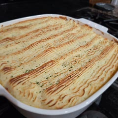 Added some red wine to the beef. Piped the potatoes onto the beef with a pastry bag. Broiled it for 5 mins at the end to get the top crispy and brown. Came out pretty good. 