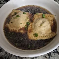 I'm getting better with the pasta. Pork bratwurst in the filling. It is tender, herby, and delicious. 