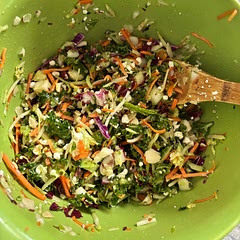 I shop at Aldi and used 1/2 bag of their organic kale & 1/2 bag of their Coleslaw Mix - Chop pulsed in food processor together. Moved to large bowl and added the dressing, salt & pepper. Used sunflower seeds instead of almonds this time. So good. Has just the right amount of crunch!