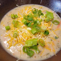 First, I added shredded carrots in the same proportion as celery. Then heated the carrots in some avacado oil for 2 min, then added the celery for 2 min, then the ham for 2 min, then the onion for 2 min and added 2t of minced garlic. Added 1t of Italian seasoning, 1t of thyme, 3 bay leaves, 1/8t of red pepper flakes (use 1/4t next time). Then started following the directions with adding the broth and potatoes. When soup was done, added 2T of parsley. Garnished servings with shredded cheese and green onion. Husband loved it. 