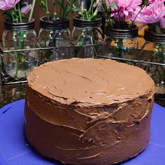 I made this recipe with gluten free flour, used 1/2 cup of melted butter instead of oil, and used a more expensive unsweetened cocoa than Hershey's (because the store was out of Hershey's!).  This cake was sooooo moist, rose nicely and doesn't taste gluten free.  I used store bought frosting instead of making it from scratch (my daughter's birthday request).  