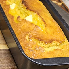 I did it in a loaf pan for 35 minutes and it was perfect! I think there's a little too much sugar, personally. I would do half a cup of granulated sugar at most, or less if you intend to put honey ontop afterwards.