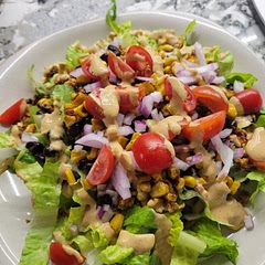 Made this dish for cinco de mayo. It's easy to.come together, once you make the chickpea-walnut taco crumble and the southwest dressing. I roasted the corn and added chilanto and a chipotle pepper to the dressing. I also added nutritional yeast to the crumble. But otherwise followed the recipe. Flavours are great and would definitely make again. 