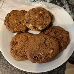 I used dark brown sugar hence the colour,  300g mixed chocolate chips and I added sultanas 