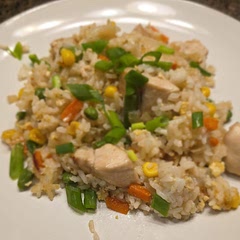 Excellent! Few things to add that the recipe didn't,  and a few pointers to get that nice, fried, restaurant style rice:
Rinse your rice ONCE. Don't double rinse. Add 2 tbspof grass fed, lightly salted butter to the rice and fully incorporate. 
Season the chicken with garlic seasoning and rotisserie spice. WOW. Set chicken pieces aside and add sesame oil to pan. Add onions and veggies. Once onions are translucent, CRACK THE EGGS DIRECTLY INTO VEGGIE MIX. This coats the veggies to give the final dish JUST what you are looking for! Add the chicken to the veggies and then the rice. Smoosh flat into the pan and let rice 'fry' on medium high heat- about 4 minutes. Stir, and do again. 
Serve hot with sliced green onions and THANK ME LATER!!! 
😁