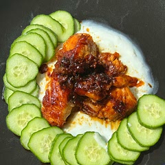 1 sriracha 2 honey 1 olive oil 
On top of some garlic and ginger yogurt sauce