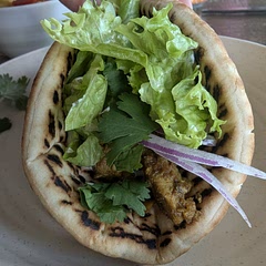 I added hot cayenne so it had a nice little kick to it. The family loves it (I was the only one that has ever had it before) 
I cooked the chicken in a cast iron to save time and preserve the char taste. I also added a dash or two of smoked paprika. 
Topped with Greek yogurt, cilantro, fresh red onion, and romaine. 
Served with chickpea cucumber salad (message me for the recipe, or Google it, there are lots of variations) 🤍 